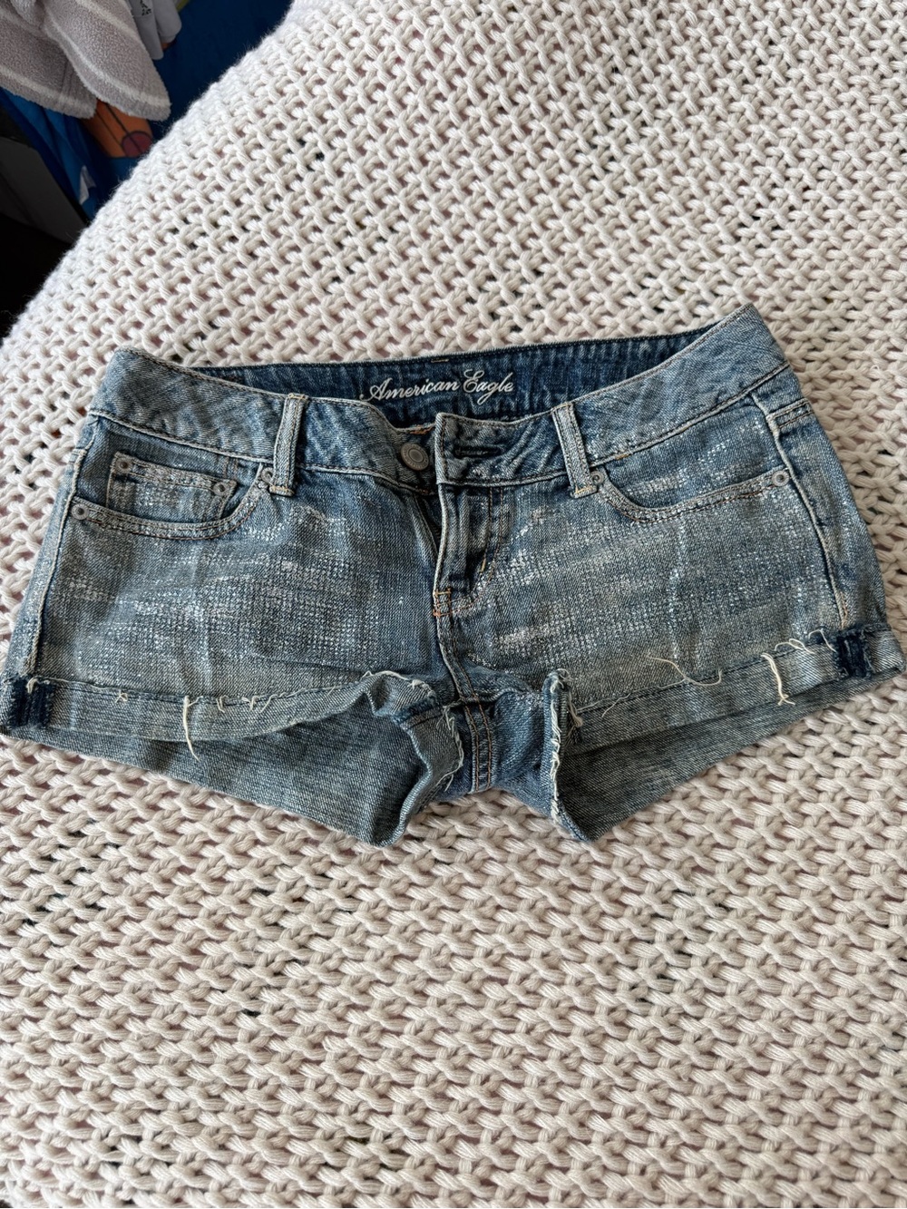 American Eagle Outfitters Women’s Distressed Denim Shorts with sparkle details